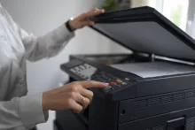 woman at work using printer